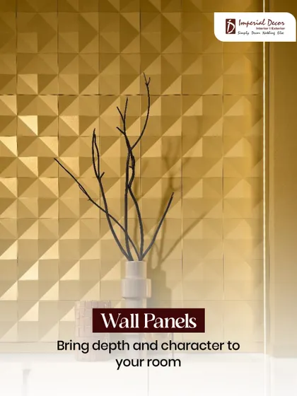 These golden, geometric wall panels bring incredible depth and character to this room. The metallic finish catches the light beautifully, creating a dynamic and luxurious feature wall that serves as a piece of art.
