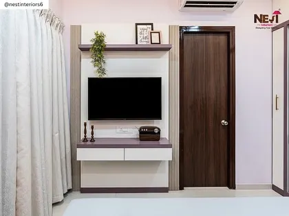A simple and clean TV unit for the bedroom. It provides necessary storage without taking up too much space, keeping the room feeling open and uncluttered.