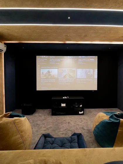 A duplicate of 275, this image showcases the thoughtful layout that provides both premium recliner seating and a casual, relaxed area for kids or pets.