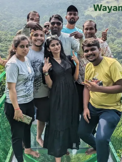 Standing on the glass bridge at 900 Kandi, Wayanad. It's a thrilling spot for photos, with a clear view of the deep valley right below your feet.