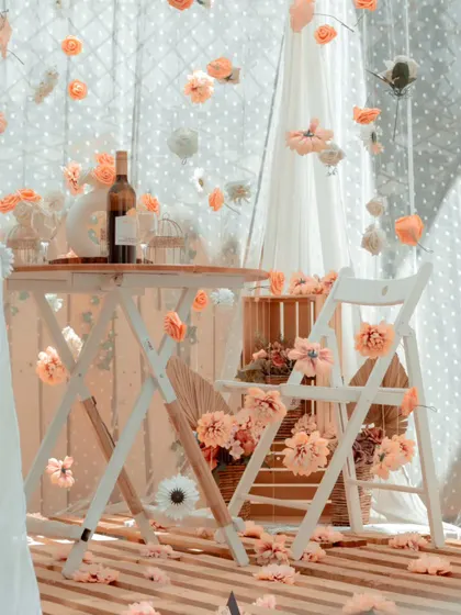 This is an artistic shot of my dreamy canopy with hanging flowers. The soft, peachy tones and ethereal quality make it an ideal setting for a romantic surprise or an aesthetic photoshoot.