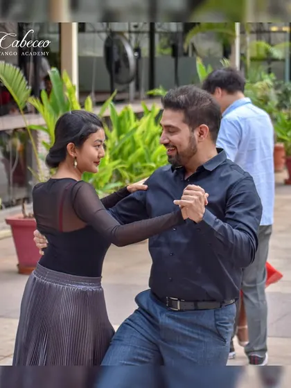 A candid shot from our flash mob at UB City. It was a wonderful experience to share the beauty of Argentine Tango with the public and see our students dance with such confidence and joy.