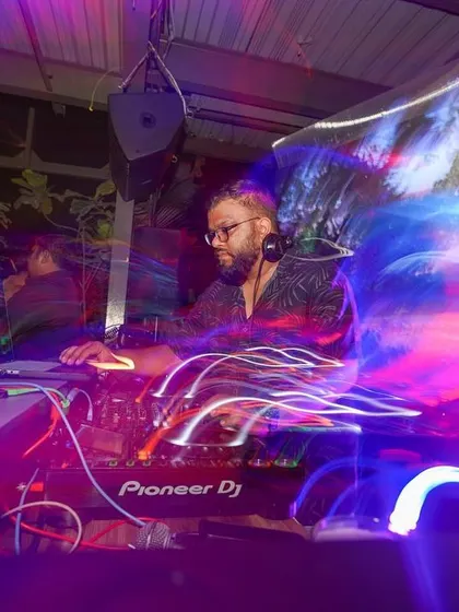 The light trails capture the motion and energy of the night. This is me in my element, crafting the perfect vibe for the dance floor.