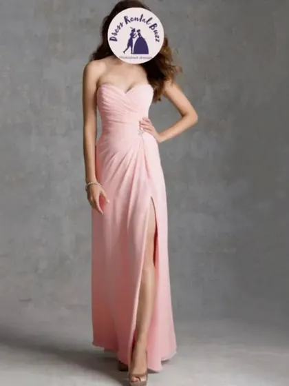 A soft pink chiffon gown with a sweetheart neckline and a thigh high slit, perfect for a romantic and feminine look.