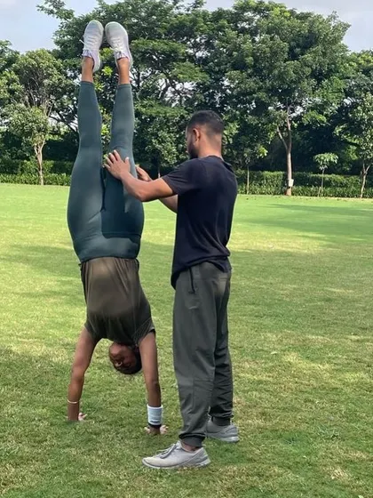 Leveling up my skills game by practicing unsupported handstands. My shoulders are shot, but the progress is worth it.