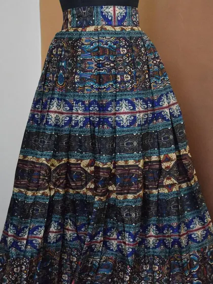 This beautiful Kalamkari-inspired printed skirt offers endless styling possibilities. Pair it with a simple crop top or a short kurti to create a stunning fusion look.