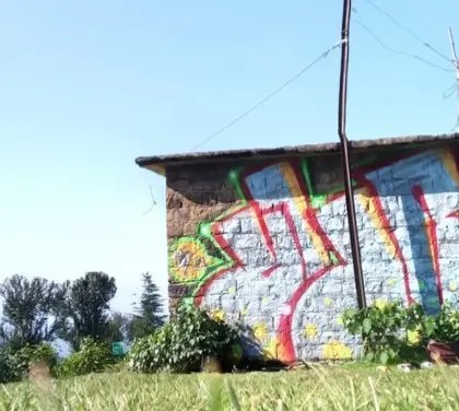A graffiti throw-up I painted on a small stone structure in Dharamshala. I love leaving my art in the mountains.