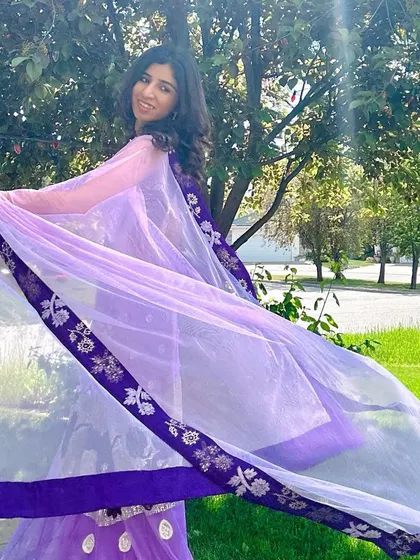Another angle from this sunny outdoor photoshoot in a lovely purple lehenga.