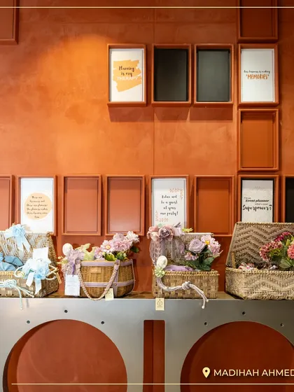 A view of our new Ahmedabad store, showcasing a collection of rustic and charming wicker-style hampers, perfect for daytime events or more organic-themed celebrations.