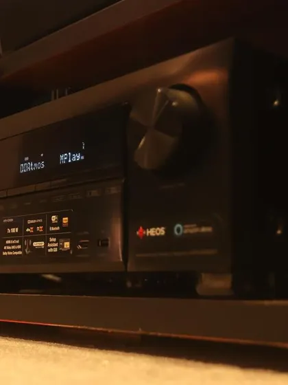 A duplicate of 314, this shot again focuses on the powerful Denon receiver, a critical component for any high-performance home theater system.