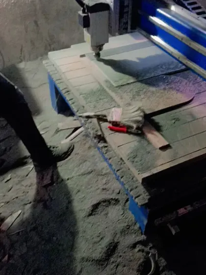 A CNC machine at work, cutting an intricate design onto an MDF sheet for a wardrobe shutter. This technology allows for incredible precision and customization.