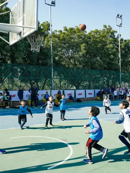 A young player takes a jump shot during a drill. We teach proper shooting form to all age groups.