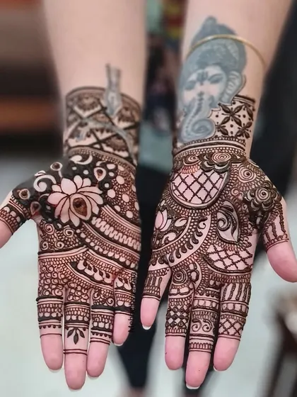 This bridal design was so fun to create, working around the client's existing tattoos to create a cohesive and beautiful piece of art.