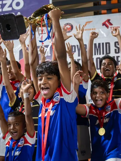 Pure joy and celebration as our U11 champions lift the trophy high. These are the moments we work for.
