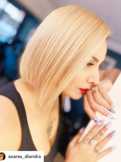 Platinum perfection. This sharp, clean bob in a stunning platinum blonde is a bold and confident statement.