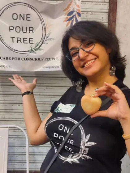 Holding up a soap at the Gracias Granny Christmas Carnival. Every event is a new opportunity to make friends and share my passion.