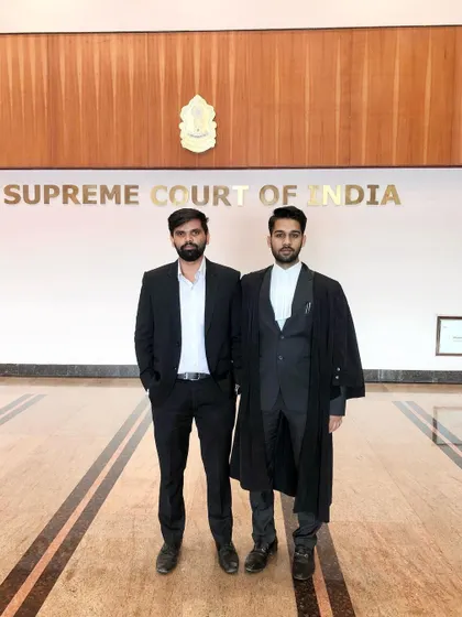 With a colleague inside the Supreme Court building. The end of a year is a time to reflect on the opportunities and learnings that have shaped our practice.