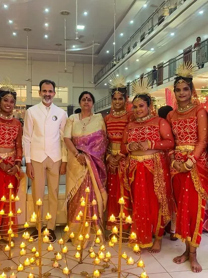 We were honored to perform for the family of the esteemed Dr. Rajkumar. Here is our team with the family at an event in Chitradurga, surrounded by our Diya props.