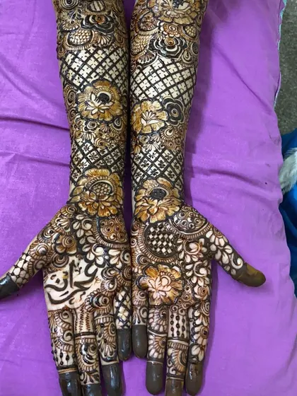 This is a detailed view of my intricate bridal henna work. Each design is unique, combining traditional patterns like paisleys and mandalas with fine-line fillers to create a stunning, full-coverage look for your special day.