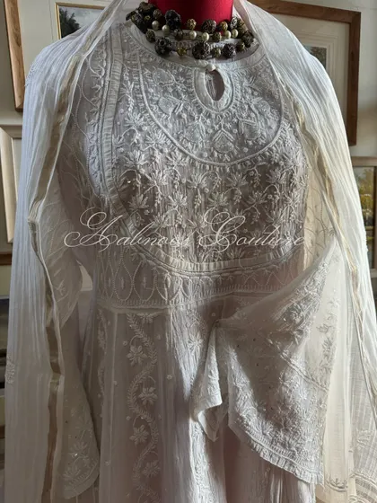 A slightly different angle, capturing the light on the delicate white-on-white embroidery.