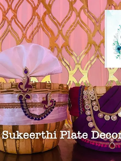 An elegant Uppukudai set with a rich purple and magenta theme, designed to complement a luxurious event backdrop.