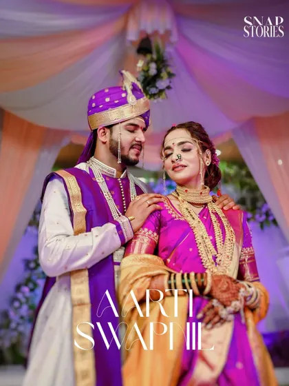 A romantic portrait of a couple in their vibrant purple and pink wedding attire. We use color and light to create visually stunning images that reflect the mood of your celebration.