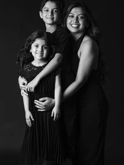 A beautiful multi-generational portrait. Black and white adds a layer of elegance and timelessness to this image of a mother and her two children.