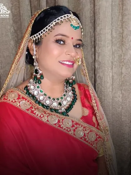 This bride looks radiant and happy. I used a combination of traditional makeup techniques with a modern touch to create a look that felt both classic and personal to her.