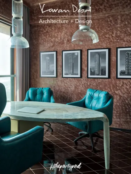 A full view of the home office in "The Party Pad," with its rich, textured walls and stunning sea view. It’s a space that’s both productive and inspiring.