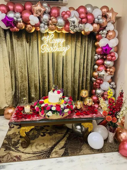 Another view of the birthday decor after the cake and other elements were added. We work with you to create a complete and cohesive look for your celebration.