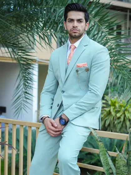 Another shot of the mint green suit, showing how the color stands out.