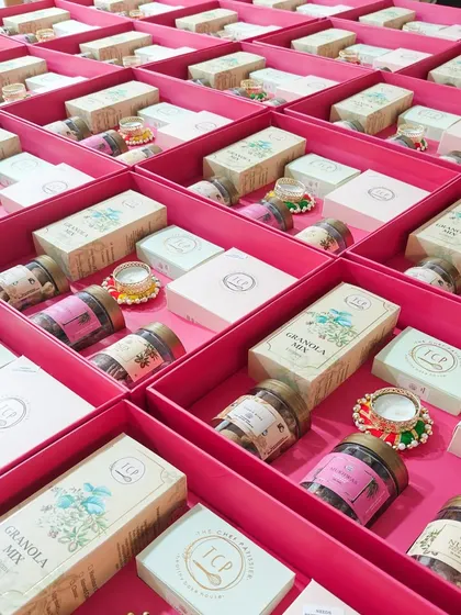 This is a familiar sight in our studio during the festive season. Rows of vibrant boxes being prepared for a large corporate Diwali order, each one checked for quality.