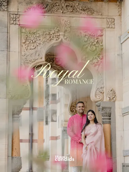 A creative shot with a pink color flare, titled "Royal Romance." This adds a dreamy, artistic touch to their palace pre-wedding portraits.