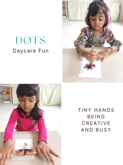 Our daycare is a place for creative expression. These girls are focused on their painting, learning about colors and developing their fine motor skills in a relaxed and joyful environment.