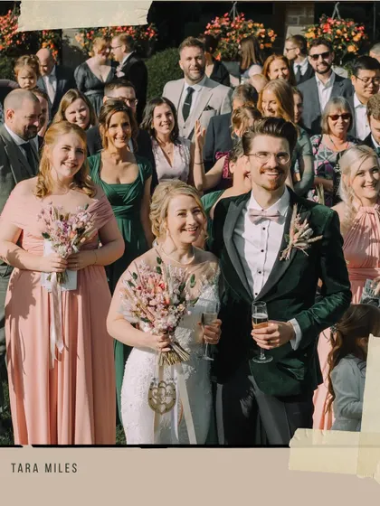 A close-up of the couple and their bridesmaid, capturing the smiles and happy interactions during the celebration.