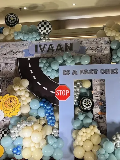 A fun photo frame prop that says 'Ivaan is a Fast One!', part of our Mickey Mouse racing theme.