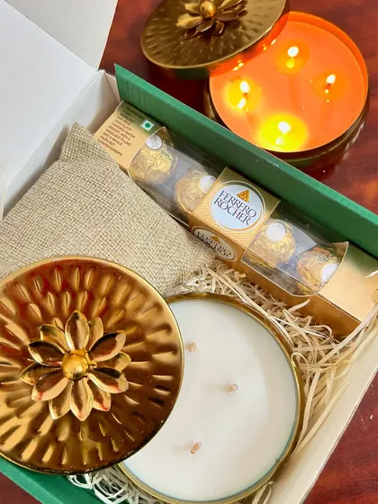 I also create complete gift hampers. This Diwali hamper was a favorite, featuring one of my metal urli candles, some Ferrero Rocher chocolates, and premium dry fruits, all packed beautifully in a festive box.