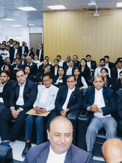 A hall full of esteemed members of the bar and judiciary at the Dr. B. R. Ambedkar Jayanti function.