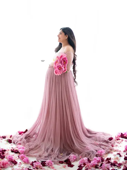 This portrait combines a flowing gown with scattered petals on the floor. I'll teach you these simple but effective techniques to add a touch of romance and color to your images.