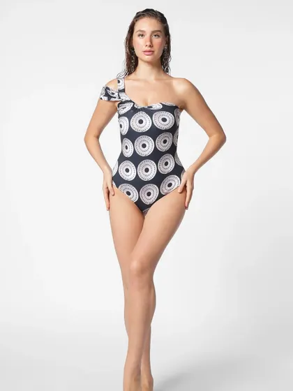 The full look for the Eka Stories swimwear campaign. The natural, glowing makeup ensures the model looks fresh and beautiful without distracting from the product.