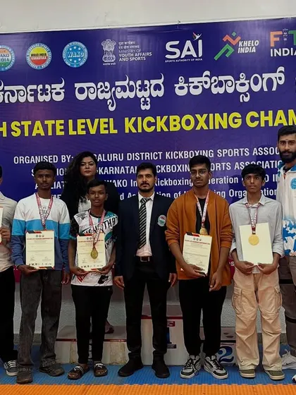 My fighters on the podium at the 5th State Level Kickboxing Championship. We dominated the event with multiple medal winners.