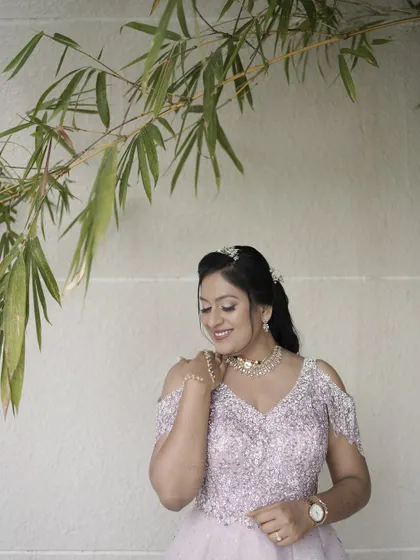 Another beautiful portrait from her reception. The soft, romantic makeup is the perfect complement to her elegant gown and diamond jewellery.