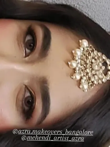 Another angle of the soft glam eye makeup, showing how it opens up the eyes. This look is paired with perfectly shaped eyebrows and a subtle highlight on the brow bone for a complete, polished finish.