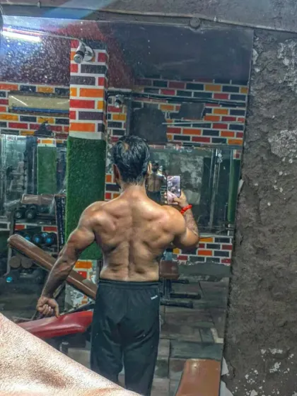 A look at my back. This is the result of countless pull-ups, rows, and deadlifts.