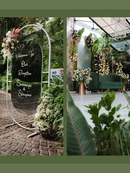 A modern, oval-shaped acrylic welcome sign greeted guests at the brunch reception. Adorned with a simple floral arrangement, it set a tone of contemporary elegance.