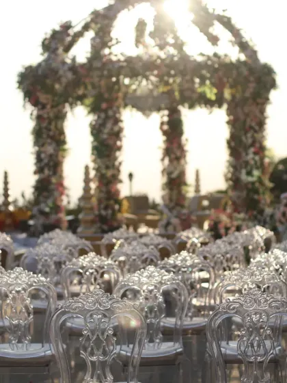 The sun setting over the mandap. This magical light is what we strive to capture in our live event paintings.