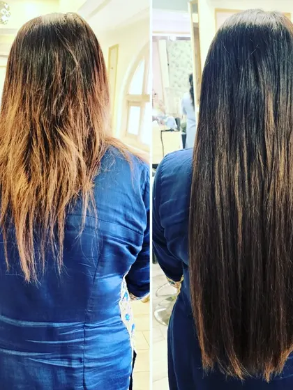 This transformation corrected uneven ends and added significant length, resulting in a sleek, healthy, and voluminous style.