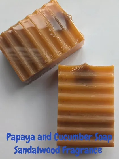 This bar is made with papaya and cucumber, known for their anti-tanning and moisturizing benefits. It has a grounding Sandalwood fragrance and a gentle exfoliating texture.