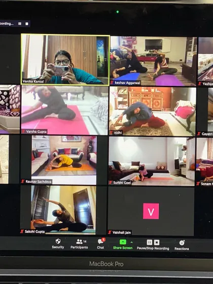Here I am, taking a moment to capture my amazing students during a deep stretching session. It's so inspiring to see everyone committed to their practice, bending and breathing together.