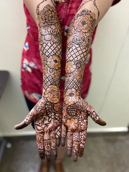 This is a detailed view of my intricate bridal henna work. Each design is unique, combining traditional patterns like paisleys and mandalas with fine-line fillers to create a stunning, full-coverage look for your special day.